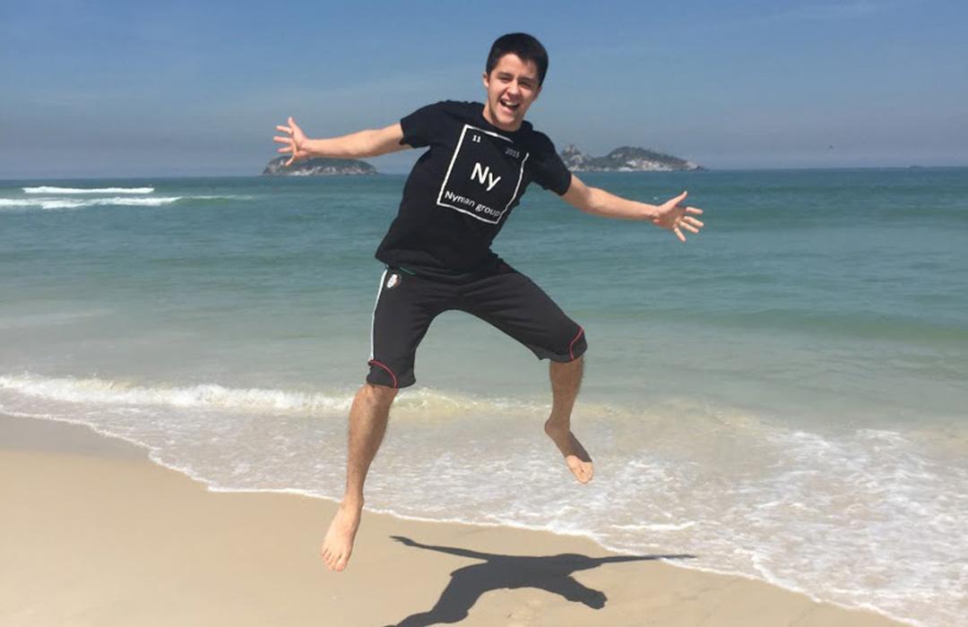 Collin Muniz jumping on ocean shore