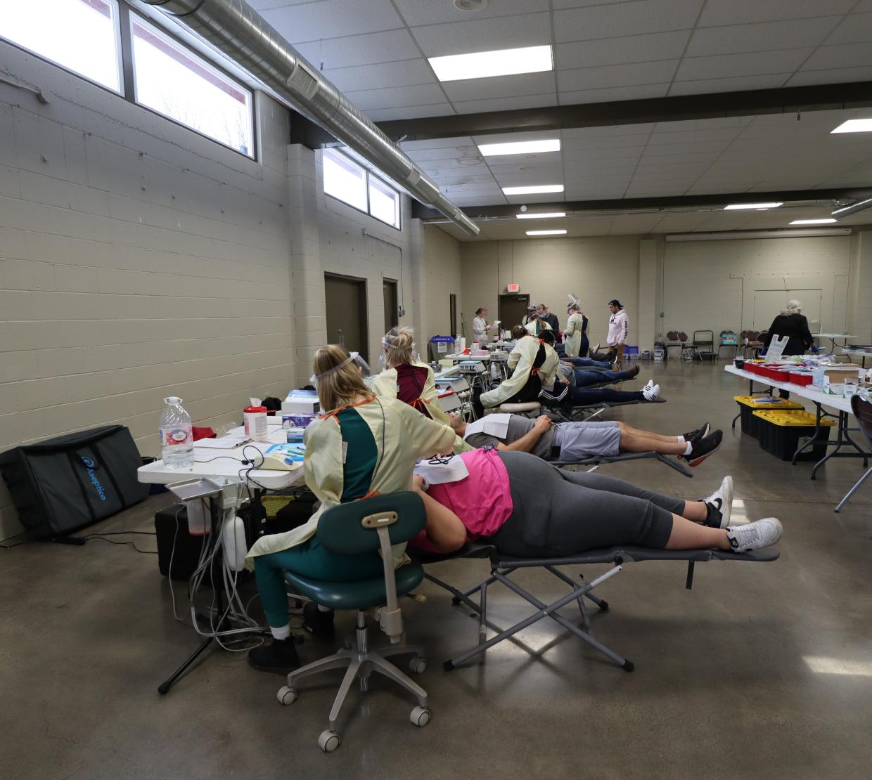 Patients receive dental care during the free dental clinic.