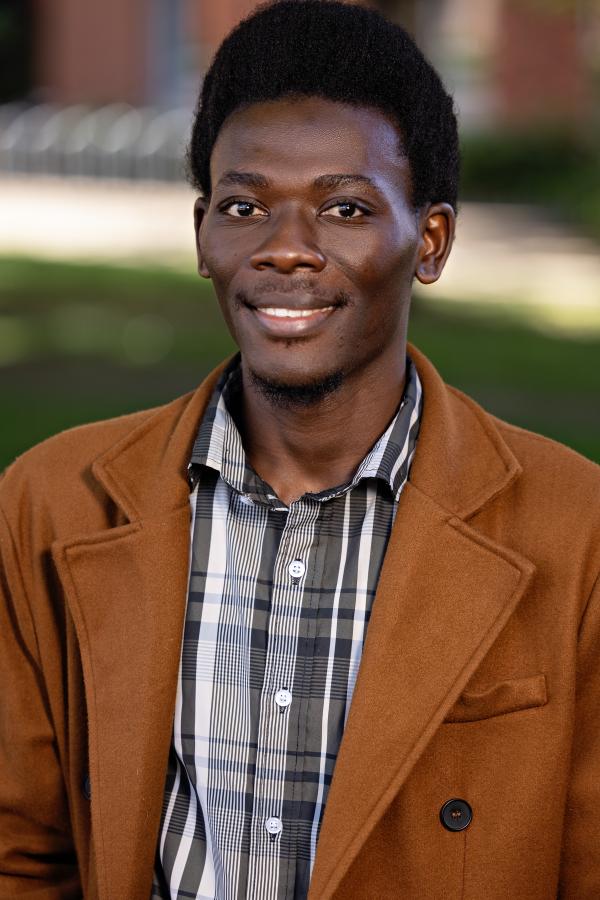 Smiling headshot of Silas Blessed