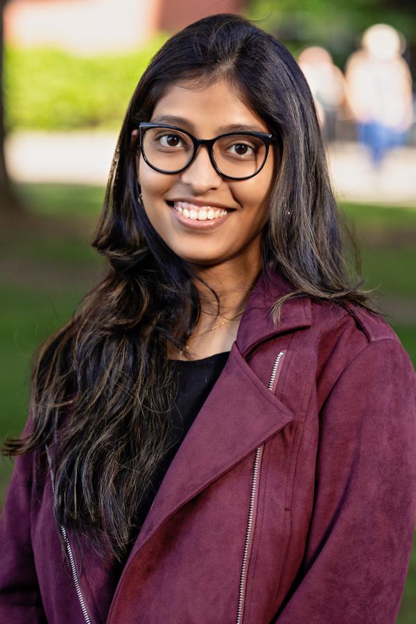 Smiling headshot of Ayantika Dan