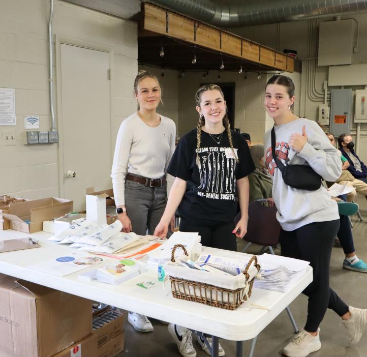 Students pose for a picture during free dental event.