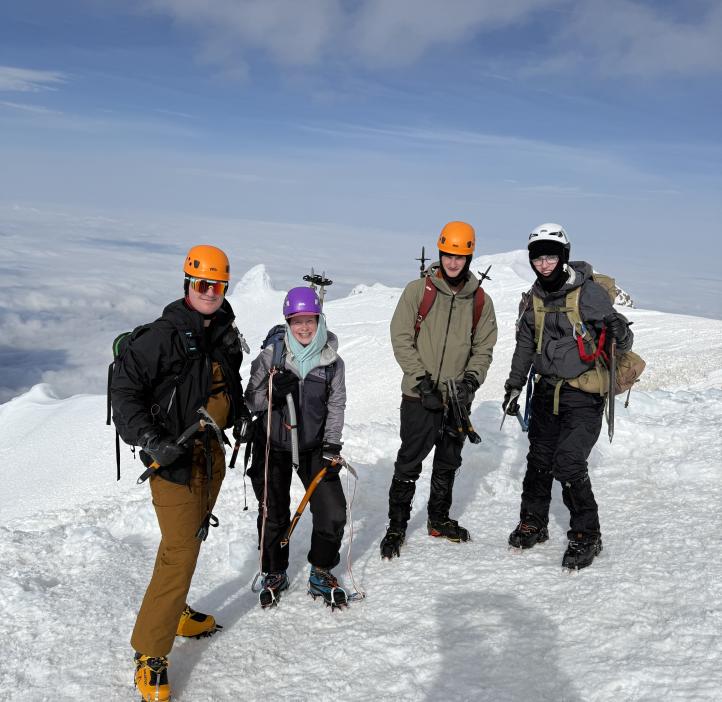 People on top of a mountain.