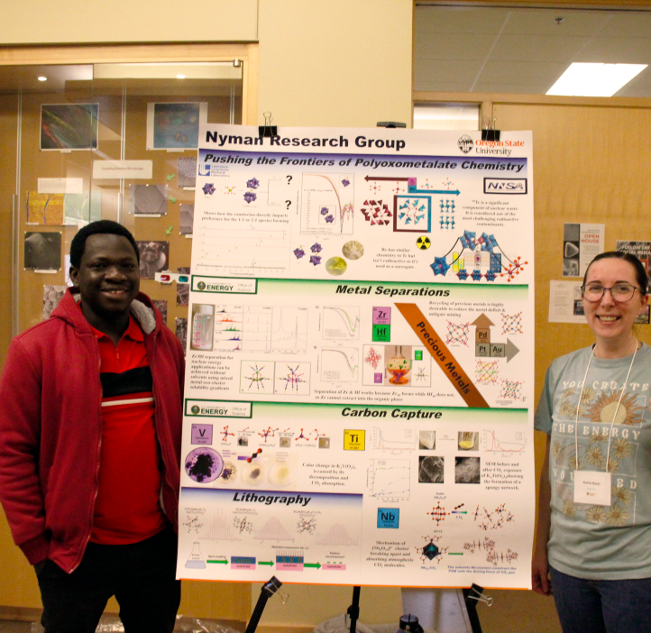 Doctor Stephen and Karlie Bach with their poster presentation.